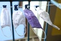 The four face masks are made of fabric hanging under the clothes rack. When used, it is necessary to wash and dry in the sun.