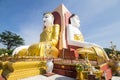 Four Faces of Buddha at Kyaikpun Buddha, Bago, Myanmar Royalty Free Stock Photo