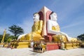 Four Faces of Buddha at Kyaikpun Buddha, Bago, Myanmar Royalty Free Stock Photo