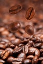 Four falling coffee beans Royalty Free Stock Photo