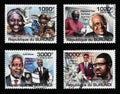 Four famous african leaders on a series of stamps
