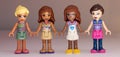 Four female Lego figurines