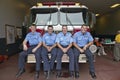 Four firemen Royalty Free Stock Photo