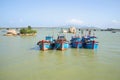 Four fishing schooners anchored at the mouth of the Cai river. Nha Trang, Vietnam