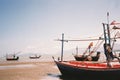 Four Fishing Ship Landing on Beach. Pran, Thailand. Royalty Free Stock Photo