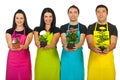 Four florist workers showing plants Royalty Free Stock Photo