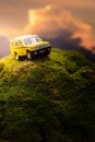 Four by four off road car crossing through  the mountain covered with green moss. Royalty Free Stock Photo