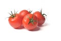 Four fresh tomatoes with water droplets on it in pure white background Royalty Free Stock Photo