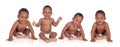 Four funny african baby sitting on the floor Royalty Free Stock Photo