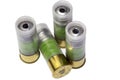Four 12 gauge hunting shotgun bullet cartridges isolated
