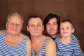 Four generations in frocks Royalty Free Stock Photo