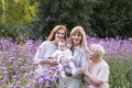 Four generations of women in a beautiful lavender field Royalty Free Stock Photo