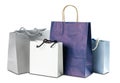 Four gift colored paper bags on white background. Close up Royalty Free Stock Photo