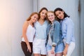 Four girlfriends looking at camera together. people, lifestyle, friendship, vocation concept Royalty Free Stock Photo