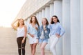 Four girlfriends looking at camera together. people, lifestyle, friendship, vocation concept Royalty Free Stock Photo