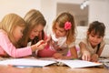 Four girls lying on the floor. Royalty Free Stock Photo