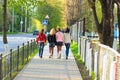 Four girls walking along the street