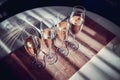 Four glasses of wine on a dining table Royalty Free Stock Photo