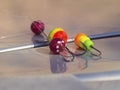 Four good colorful floats with hooks for fishing