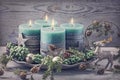 Four green christmas candle