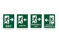 Four green emergency exit signs in different languages Royalty Free Stock Photo