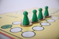 Game board green figures on money