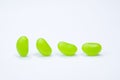 Four green jellybeans