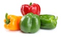 Four green, red, yellow sweet bell peppers isolated on white background Royalty Free Stock Photo