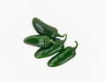 Four Green Spicy Jalapeno Peppers Isolated on White.
