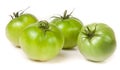 Four green unripe tomato isolated on white background Royalty Free Stock Photo