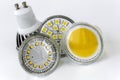 Four GU10 LED bulbs with different sizes of chips used