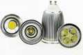 Four GU10 LED bulbs with various sizes of chips and cooling Royalty Free Stock Photo
