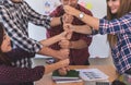 Four hand together in business meeting team concept