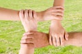 Four hands joined together Royalty Free Stock Photo