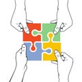 Four hands joining puzzle piece - association concept