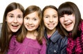 Four happy and smiling young girls Royalty Free Stock Photo