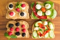 Four healthy open sandwiches for a picnic lunch