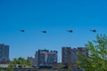 Four helicopters of russian air forces are flying in a row