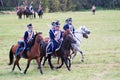 Four horses of different color and horse riders. Royalty Free Stock Photo