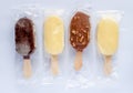 Four ice creams in plastic transparent bags Royalty Free Stock Photo