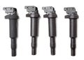 Four ignition coils for an internal combustion engine of a car during repair and service on a white isolated background. Spare Royalty Free Stock Photo