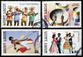 Four images of caribbean folklore on stamps