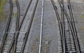 Four intersecting railway lines on gravel