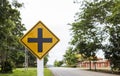 Four intersection yellow traffic sign Royalty Free Stock Photo