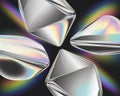 Four Iridescent Geometric Forms with Sharp Edges and Rainbow Light Reflections on a Dark Background Abstract 3D with Holographic Royalty Free Stock Photo