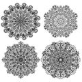 Four isolates circular mandalas with different ornaments illustration