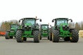 Four John Deere Agricultural Tractors on a Yard Royalty Free Stock Photo