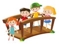 Four kids crossing wooden bridge