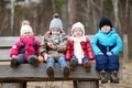 Four kids having fun on early spring Royalty Free Stock Photo