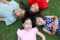 Four kids having fun in the park. Royalty Free Stock Photo